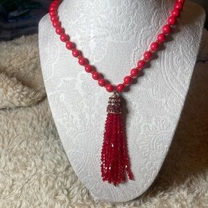 Long Necklace / red beads w/a pendant gold/darker red rhinestones & bead tassel